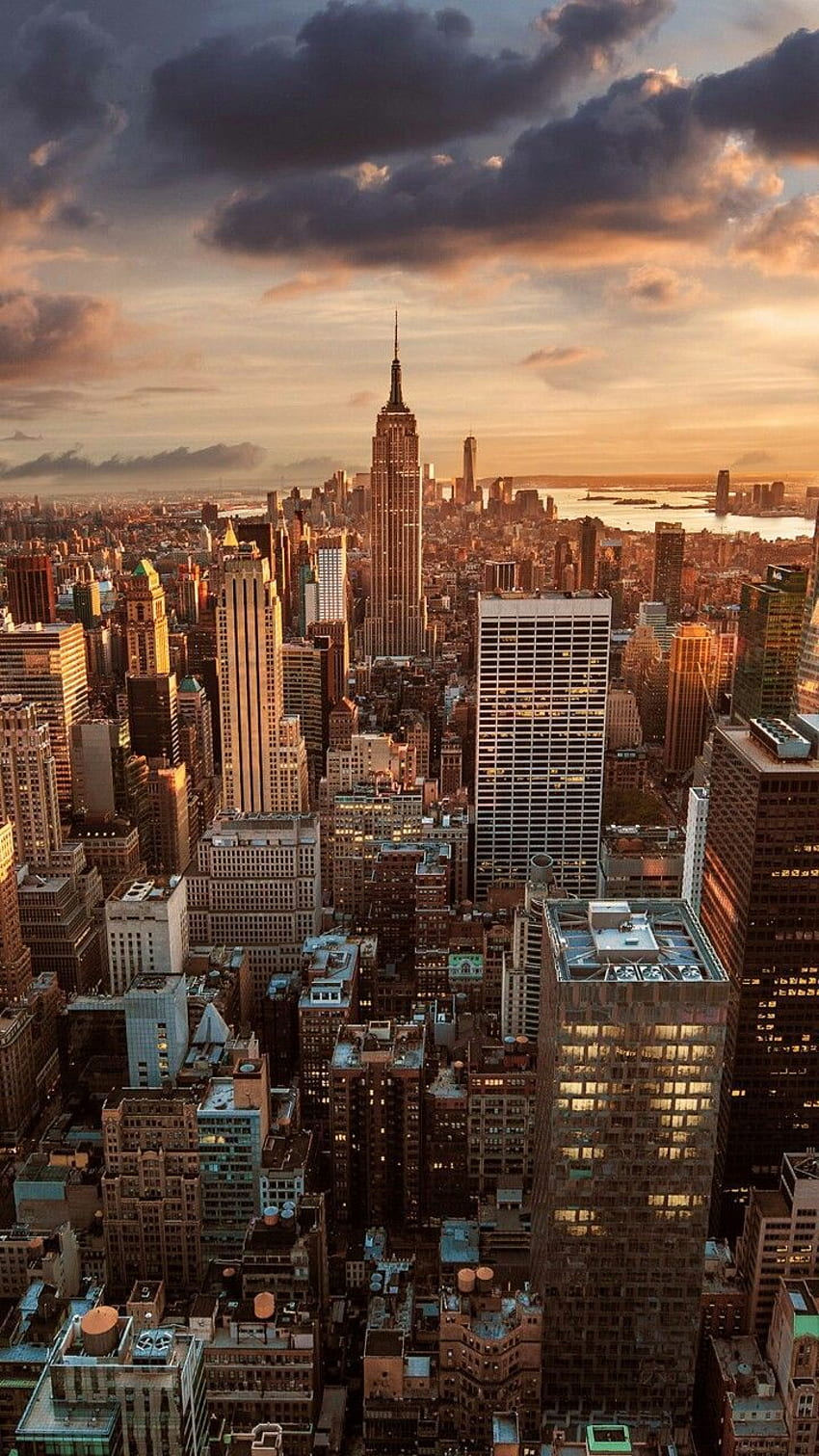 Photo of New York City skyline at sunrise.